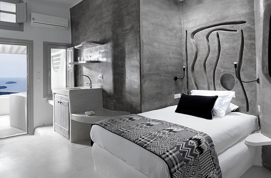 Suite de luxe avec hammam et jacuzzi extérieur privé avec vue sur la caldeira Suite de luxe avec hammam et jacuzzi extérieur privé avec vue sur la caldeira